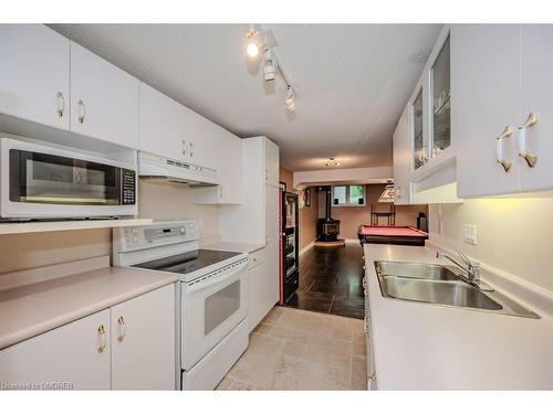 1457 Postmaster Drive, Oakville, ON - Indoor Photo Showing Kitchen With Double Sink