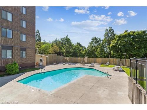 407-2556 Argyle Road, Mississauga, ON - Outdoor With In Ground Pool