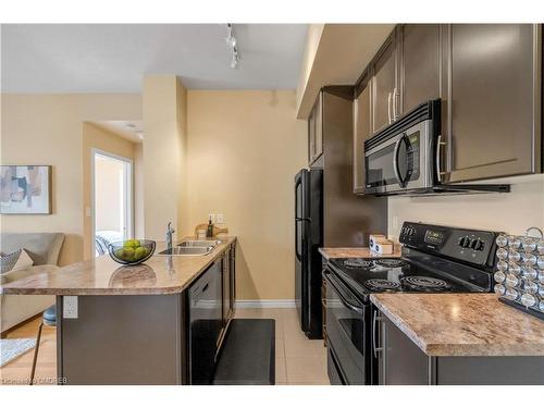 205-90 Charlton Avenue West, Hamilton, ON - Indoor Photo Showing Kitchen With Double Sink With Upgraded Kitchen