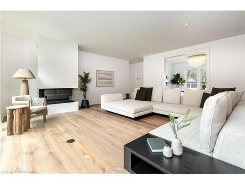 6 Morrison Place, Springwater, ON - Indoor Photo Showing Living Room With Fireplace