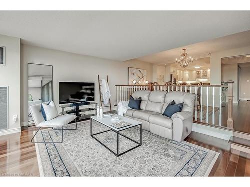 1205-2180 Marine Drive, Oakville, ON - Indoor Photo Showing Living Room
