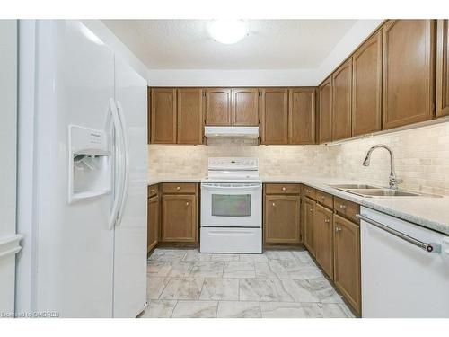 505-2175 Marine Drive, Oakville, ON - Indoor Photo Showing Kitchen With Double Sink