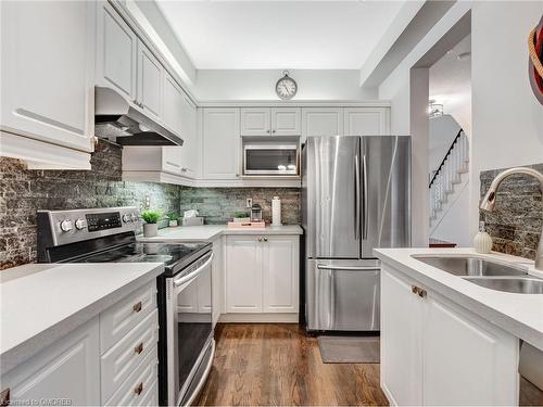 6-2229 Walker'S Line, Burlington, ON - Indoor Photo Showing Kitchen With Stainless Steel Kitchen With Double Sink With Upgraded Kitchen