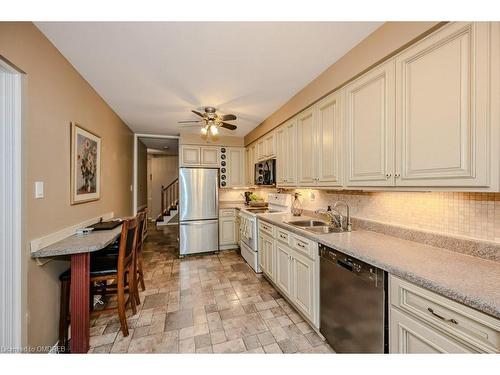 1388 Stonecutter Drive, Oakville, ON - Indoor Photo Showing Kitchen With Double Sink