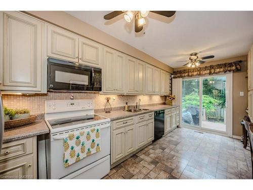 1388 Stonecutter Drive, Oakville, ON - Indoor Photo Showing Kitchen With Double Sink