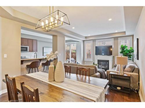 44-2019 Trawden Way, Oakville, ON - Indoor Photo Showing Other Room With Fireplace