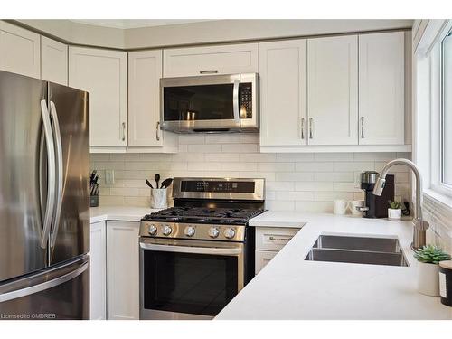 2471 Nettlecreek Crescent, Oakville, ON - Indoor Photo Showing Kitchen With Stainless Steel Kitchen With Double Sink