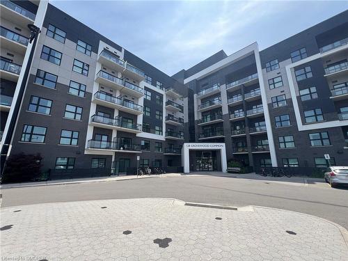 428-128 Grovewood Common, Oakville, ON - Outdoor With Balcony With Facade