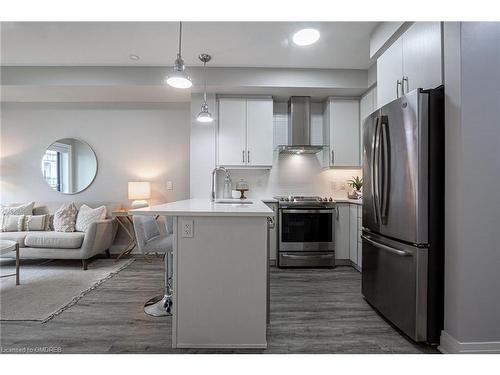 428-128 Grovewood Common, Oakville, ON - Indoor Photo Showing Kitchen With Stainless Steel Kitchen