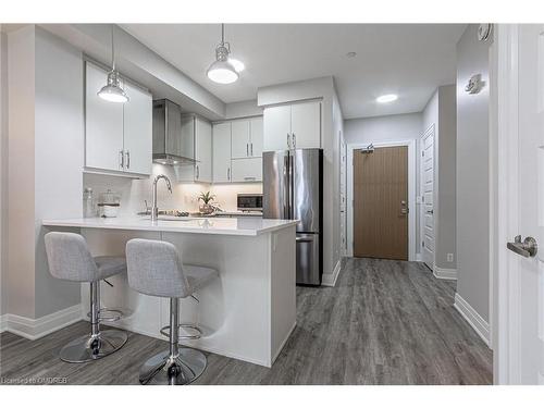 428-128 Grovewood Common, Oakville, ON - Indoor Photo Showing Kitchen With Stainless Steel Kitchen With Upgraded Kitchen