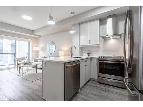 428-128 Grovewood Common, Oakville, ON - Indoor Photo Showing Kitchen With Stainless Steel Kitchen With Upgraded Kitchen