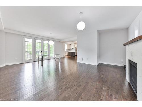 48 Rebecca Street, Oakville, ON - Indoor Photo Showing Other Room With Fireplace