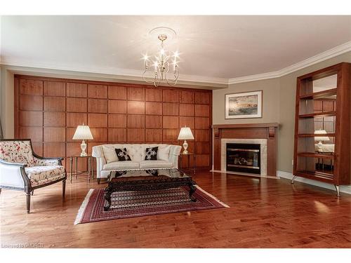 15-2400 Neyagawa Boulevard, Oakville, ON - Indoor Photo Showing Living Room With Fireplace