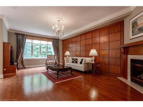 15-2400 Neyagawa Boulevard, Oakville, ON - Indoor Photo Showing Living Room With Fireplace