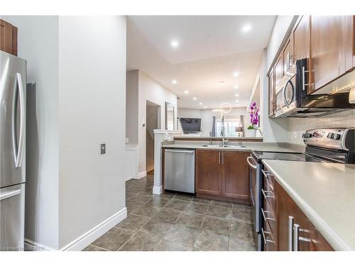 10-5080 Fairview Street, Burlington, ON - Indoor Photo Showing Kitchen With Double Sink