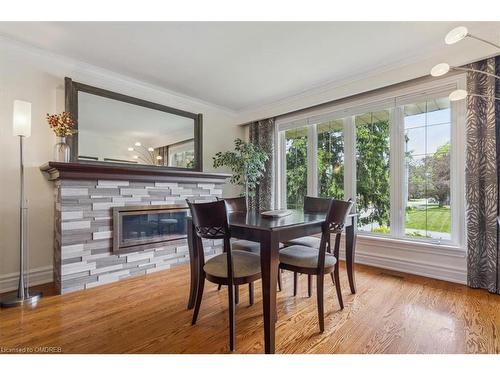 418 Willis Drive, Oakville, ON - Indoor Photo Showing Dining Room With Fireplace