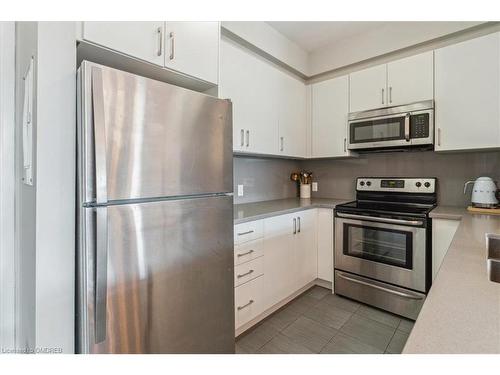 302-216 Oak Park Blvd Boulevard, Oakville, ON - Indoor Photo Showing Kitchen With Stainless Steel Kitchen