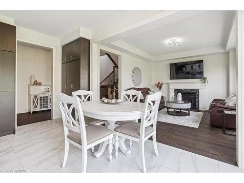 81 Granite Ridge Trail, Hamilton, ON - Indoor Photo Showing Dining Room With Fireplace