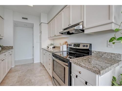 411-2199 Sixth Line, Oakville, ON - Indoor Photo Showing Kitchen With Upgraded Kitchen