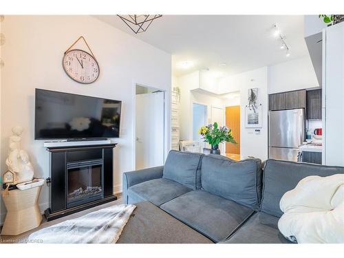 2014-30 Shore Breeze Drive, Toronto, ON - Indoor Photo Showing Living Room With Fireplace