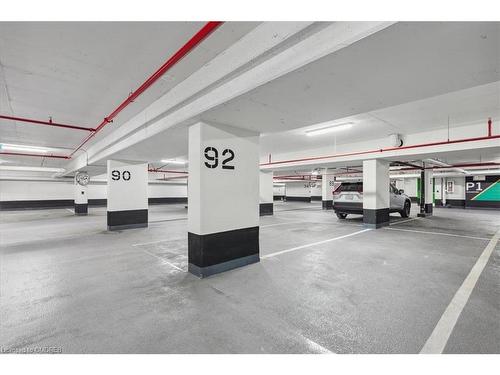 1112-2489 Taunton Road, Oakville, ON - Indoor Photo Showing Garage