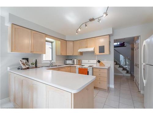 2265 Brays Lane, Oakville, ON - Indoor Photo Showing Kitchen With Double Sink