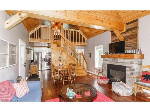 684A South Shore Road, South River, ON - Indoor Photo Showing Living Room With Fireplace