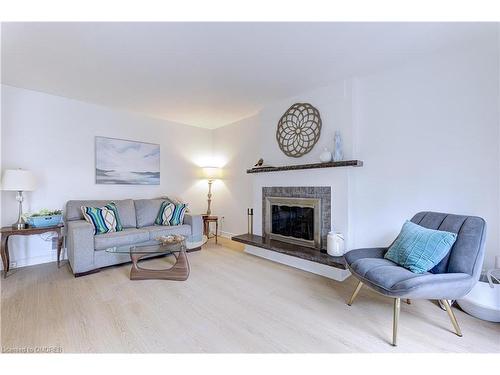 1095 Queens Avenue, Oakville, ON - Indoor Photo Showing Living Room With Fireplace