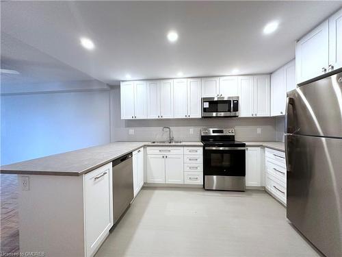 207-190 Clark Boulevard, Brampton, ON - Indoor Photo Showing Kitchen With Stainless Steel Kitchen With Double Sink