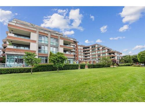 512-65 Port Street E, Mississauga, ON - Outdoor With Balcony With Facade