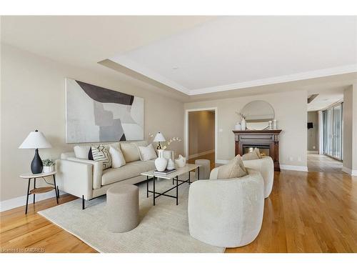 512-65 Port Street E, Mississauga, ON - Indoor Photo Showing Living Room With Fireplace