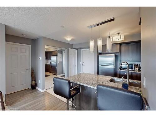 305-1005 Nadalin Heights, Milton, ON - Indoor Photo Showing Kitchen With Stainless Steel Kitchen With Upgraded Kitchen