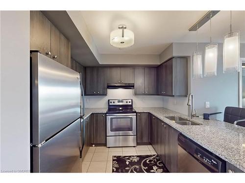 305-1005 Nadalin Heights, Milton, ON - Indoor Photo Showing Kitchen With Stainless Steel Kitchen With Double Sink With Upgraded Kitchen