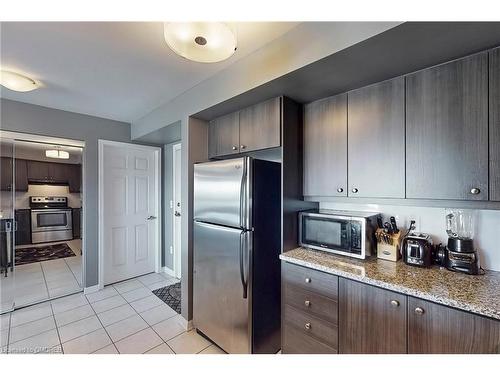 305-1005 Nadalin Heights, Milton, ON - Indoor Photo Showing Kitchen With Stainless Steel Kitchen