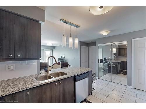 305-1005 Nadalin Heights, Milton, ON - Indoor Photo Showing Kitchen With Double Sink