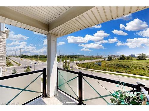 305-1005 Nadalin Heights, Milton, ON - Outdoor With Balcony With View