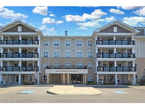 305-1005 Nadalin Heights, Milton, ON - Outdoor With Balcony With Facade