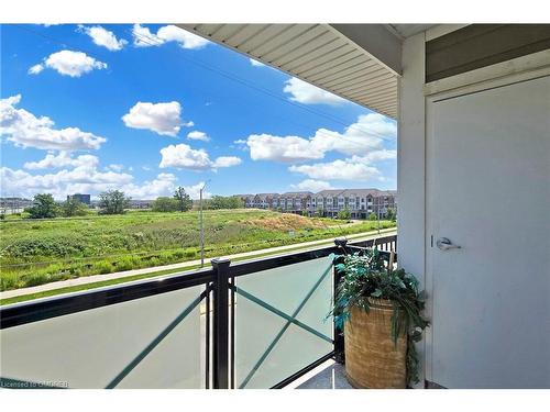 305-1005 Nadalin Heights, Milton, ON - Outdoor With Balcony With View