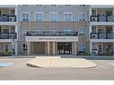 305-1005 Nadalin Heights, Milton, ON  - Outdoor With Balcony With Facade 