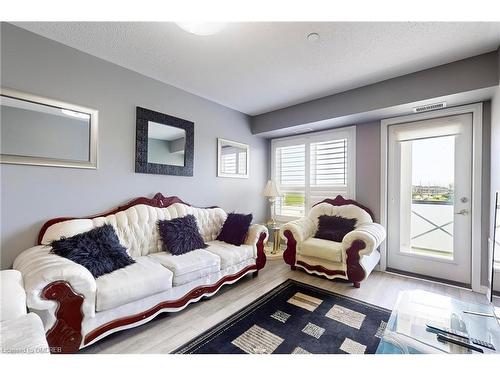 305-1005 Nadalin Heights, Milton, ON - Indoor Photo Showing Living Room