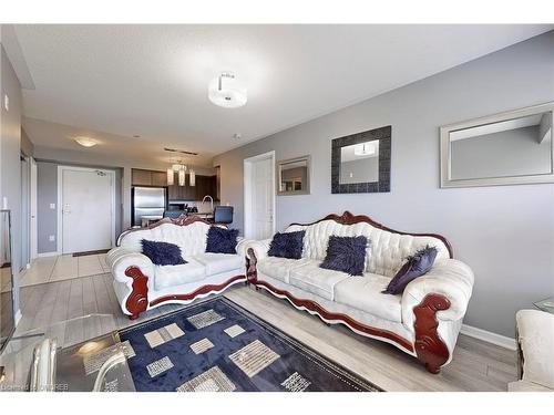 305-1005 Nadalin Heights, Milton, ON - Indoor Photo Showing Living Room