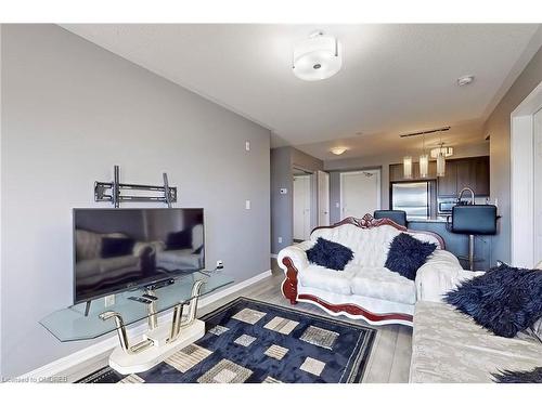 305-1005 Nadalin Heights, Milton, ON - Indoor Photo Showing Living Room