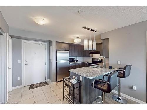 305-1005 Nadalin Heights, Milton, ON - Indoor Photo Showing Kitchen With Stainless Steel Kitchen