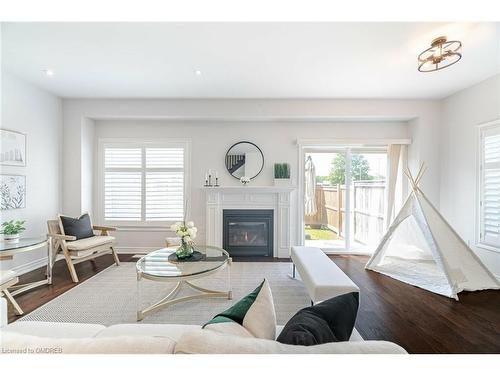 1 Sonoma Valley Crescent, Hamilton, ON - Indoor Photo Showing Living Room With Fireplace