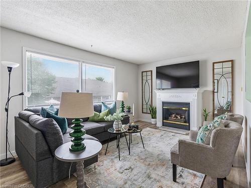 164G Henry Street, Brantford, ON - Indoor Photo Showing Living Room With Fireplace