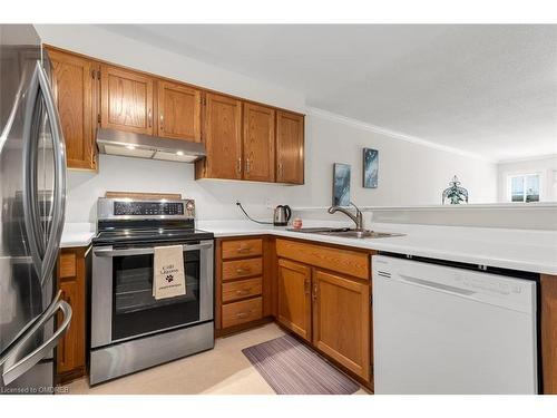 4-165 Main Street E, Grimsby, ON - Indoor Photo Showing Kitchen With Double Sink