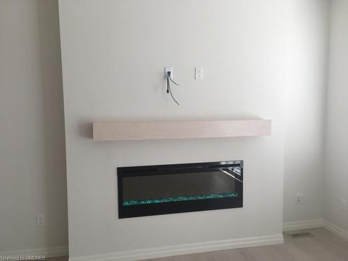 34 Renaissance Drive, St. Thomas, ON - Indoor Photo Showing Other Room With Fireplace