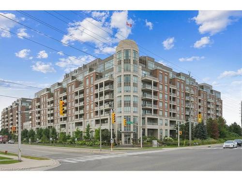 407-2480 Prince Michael Drive, Oakville, ON - Outdoor With Balcony With Facade