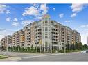 407-2480 Prince Michael Drive, Oakville, ON  - Outdoor With Balcony With Facade 