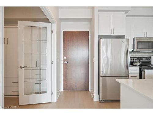 407-2480 Prince Michael Drive, Oakville, ON - Indoor Photo Showing Kitchen With Stainless Steel Kitchen